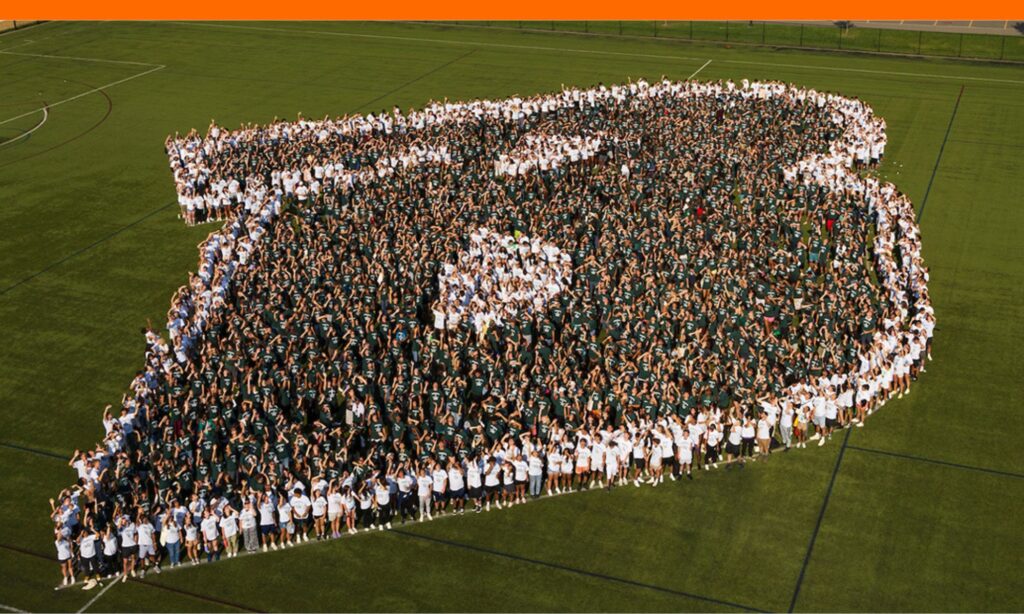 Binghamton University students forming a human logo on campus