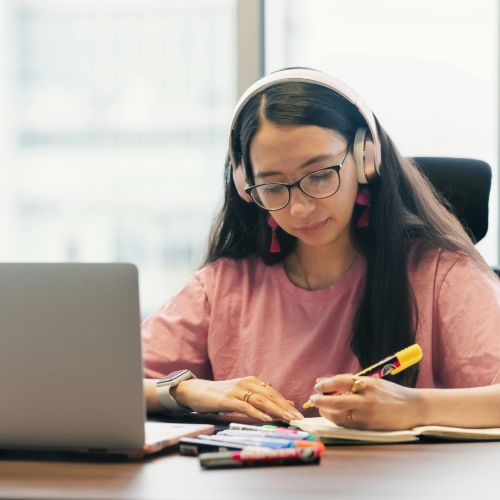 College student studying at a desk, reflecting college deferral statistics and how students deferred from college respond during the admissions waiting period.