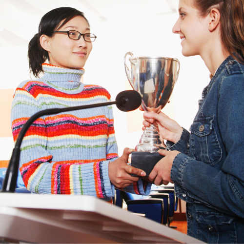 Student receiving award