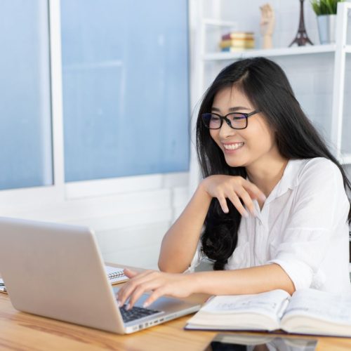 Colleges with Rolling Admissions girl reading on a computer