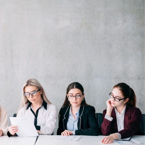 women in a committee meeting