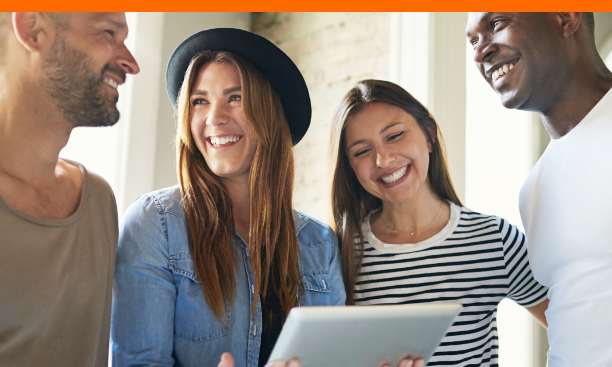 Students reviewing NYU Early Decision materials on tablet